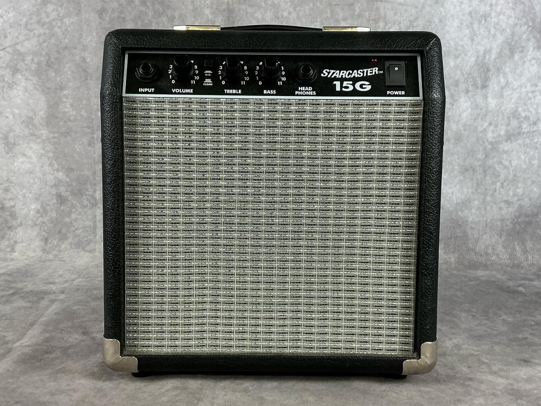 Starcaster 15G Amp: Fender model starcaster 15G. Serial number ICTF09013528. Single input, master volume knob, treble and bass equalizer, headphone jack. Good condition with minimal wear. Tested and in working condition.