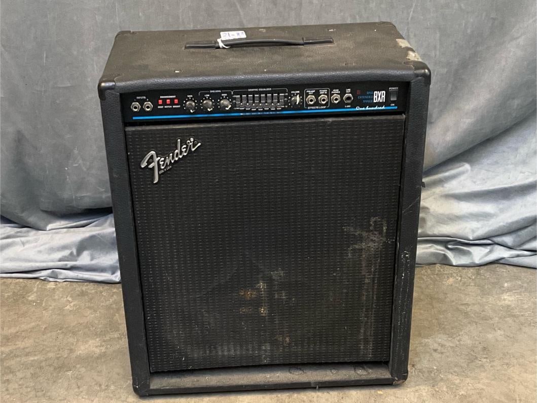 Fender Bass Amp: Fender Bass Extended Range BXR 100 Amplifier. Serial number LO- 446659. Made in USA. Surface scratches and soiled with various stains. Otherwise good condition. Tested and working. Measures 21 inches