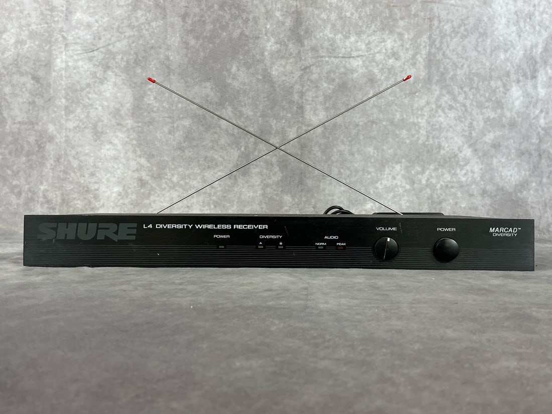 Shure L4 Diversity Wireless Receiver: Model l4-ah. Serial number R933368559. Two antennae, aux output, includes power cord. Good condition for used, tested, powers on. Measures 17 inches wide x 8.5 x 1.5 inches tall.