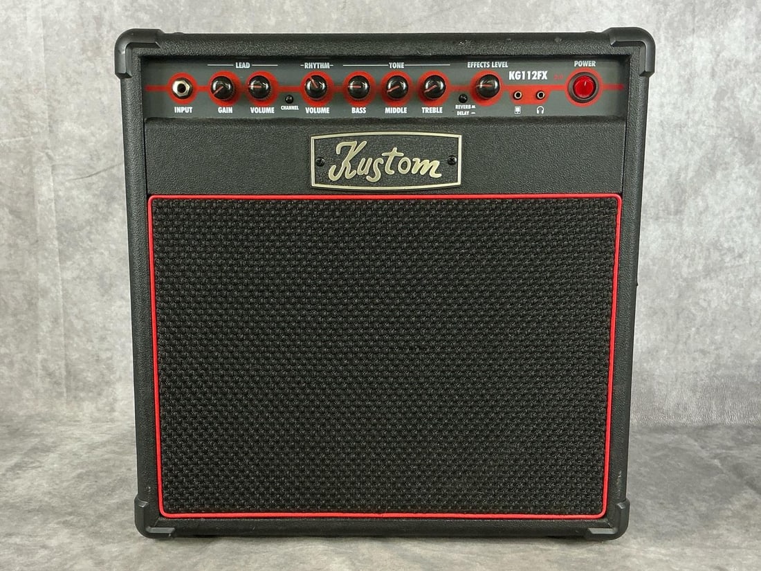 Kustom KG112FX Amp: Model kg112fx amp. Serial number 16271525. One inputs high, two lead volume knobs, three way equalizer, rhythm volume knob, headphone/mp3 jack. Good used condition. Tested, in working condition.