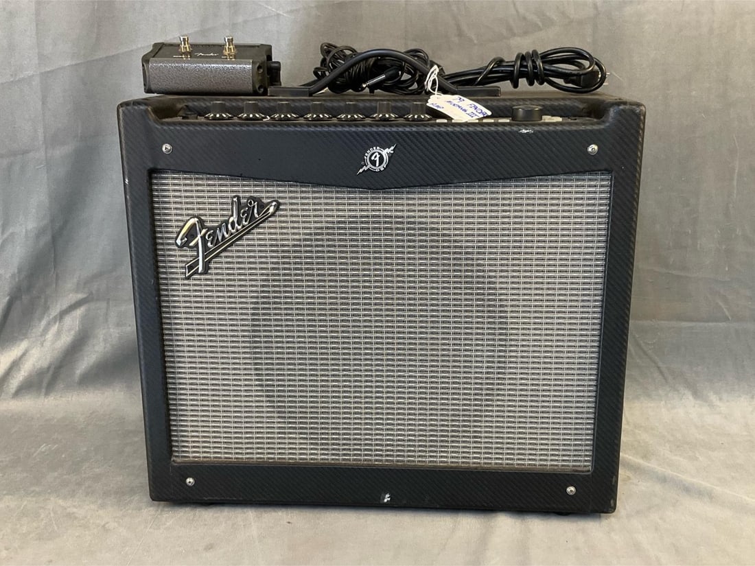 Fender Amplifier: Fender Mustang III Amplifier and Mustang MS2 Foot Pedal. Needs cleaning, otherwise good condition. Measures 20.5 inches wide x 10.25 x 17.75 inches tall.