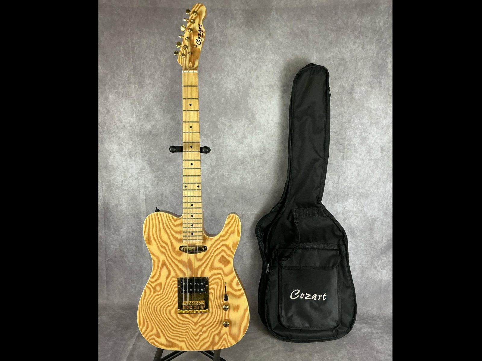 Cozart Custom Hand Made Electric Guitar: Cozart custom hand made tl body from paulownia natural finish six string electric guitar. Two volume/tone knobs, three way selector switch, bridge and neck pickups. No visible serial number. Bridge, n