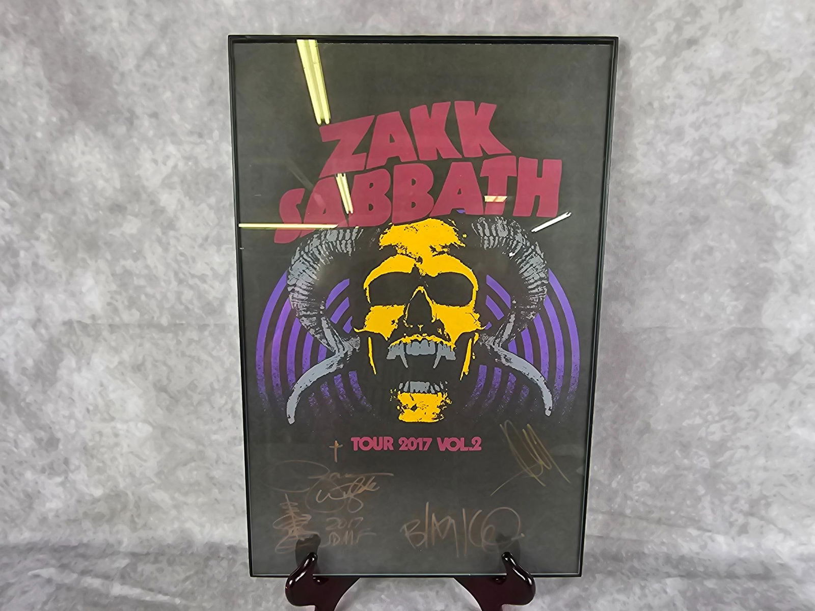 Autographed Zakk Sabbath Poster: Autographed by all three band members, Zakk Wylde, Rob "Blasko" Nicholson, and Joey Castillo. No COA. Good condition. Measures 11.25 inches wide x 17.25 inches tall.