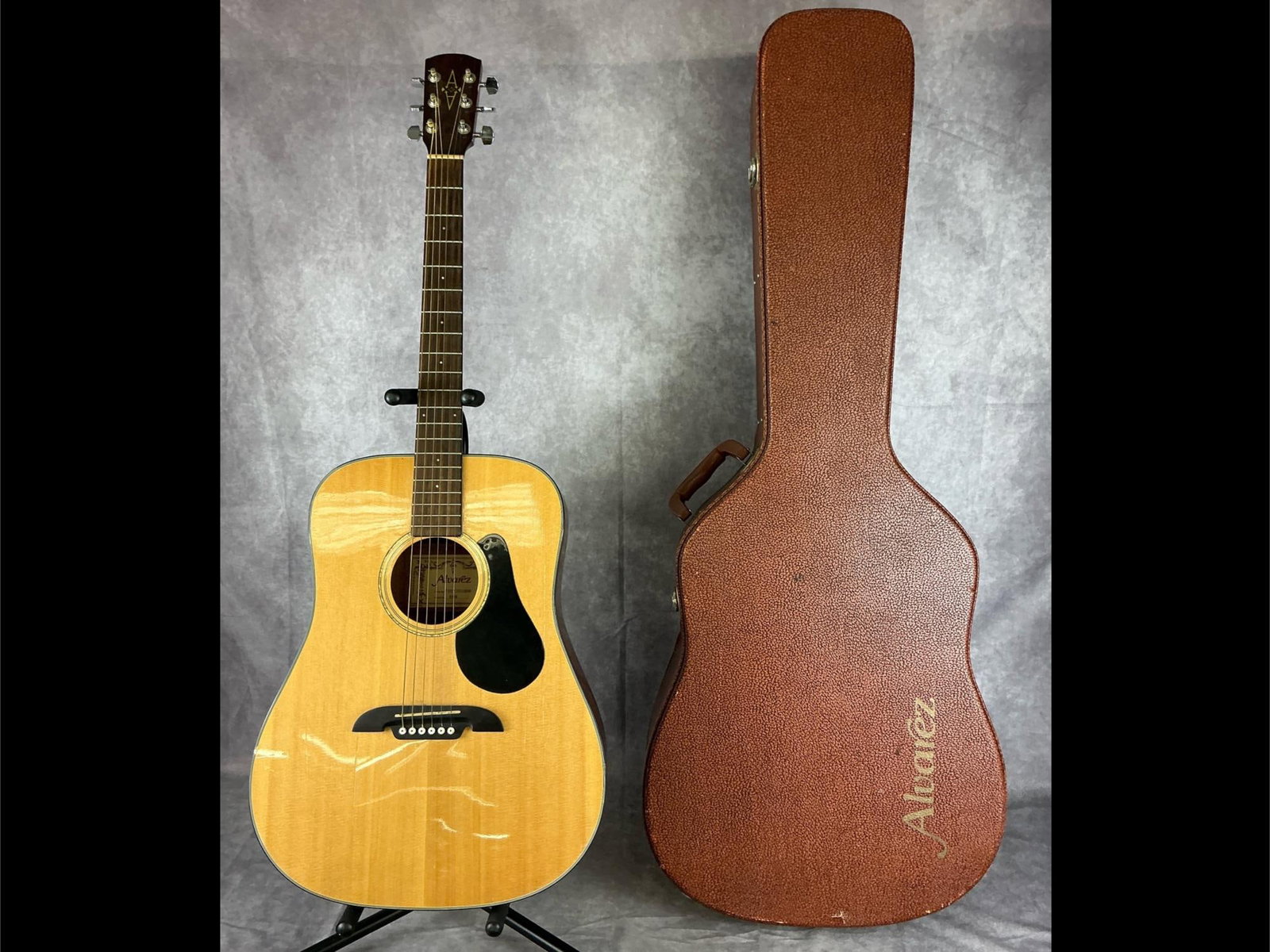 Alvarez RD8 Acoustic Guitar: Alvarez rd8 dreadnought body from rosewood and spruce top in natural finish with black pick guard six string acoustic guitar. Serial number F501250356. Bridge, neck, strings, tuners, and fretboard in