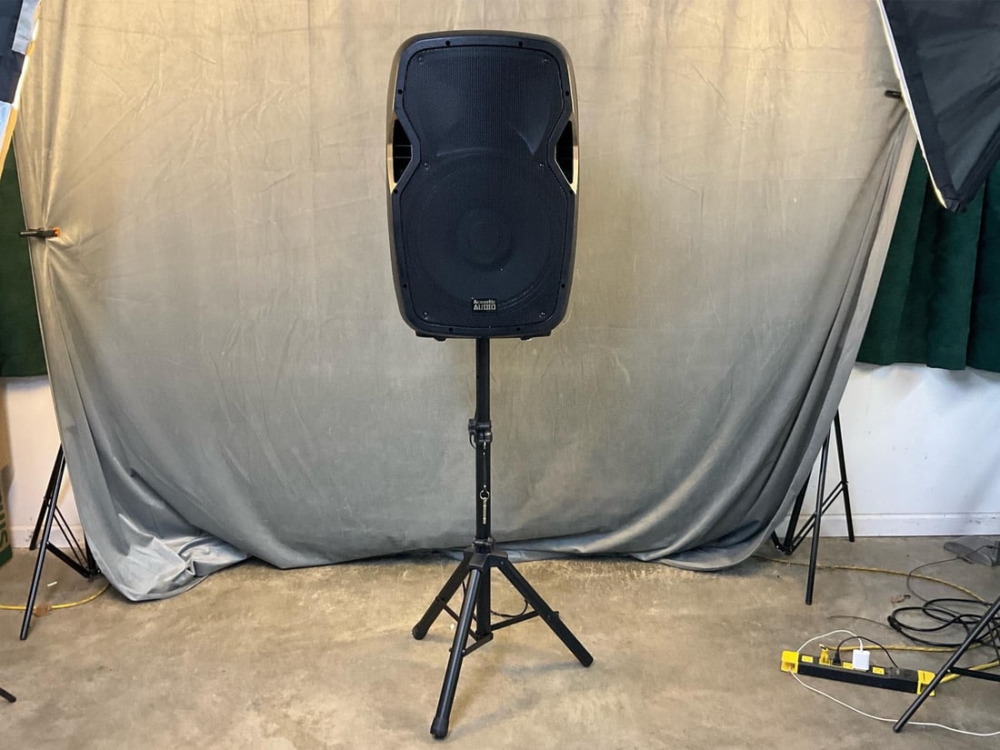Speaker with Mic and Stand: Acoustic Audio By Goldwood AA151BS 15” Active Speaker/Mic/Stand with LED light prism. In original box with accessories - cords, remote, and microphone. Powers on and works. Speaker measures 17