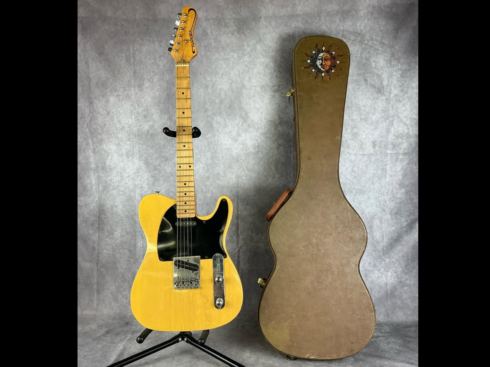 Madeira EG-71BH Telecaster Electric Guitar: Madeira eg71bh telecaster body from ash in butterscotch blonde finish with black pick guard six string electric guitar. Two volume tone knobs, three way selector switch, bridge and neck pickups. No vi