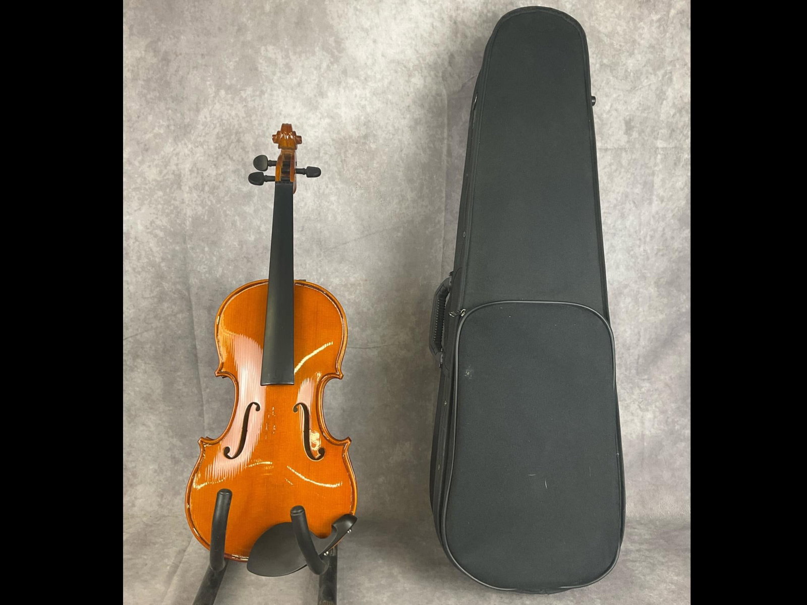 Palatino Violin: Palatino hand crafted from maple and spruce top in lacquered finish four string violin. Model vn-350. No visible serial number. Neck and fingerboard in good condition. Bridge and tailpiece detached, n