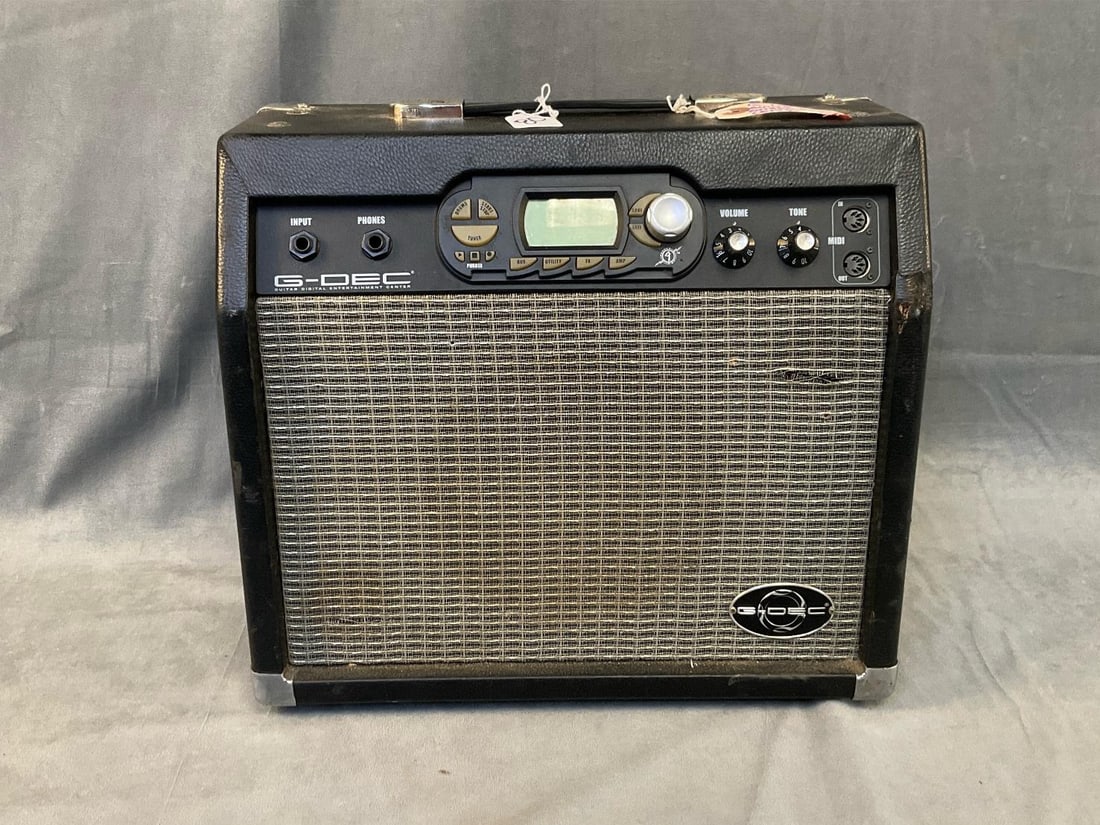 Fender Amplifier: Fender Guitar Digital Entertainment Center Amplifier. Model G-DEC. Serial Number GP068581HR. Type: PR 520. Powers on and works. Good used condition. Measures 15.5 inches wide x 7.25 x 14 inches tall.