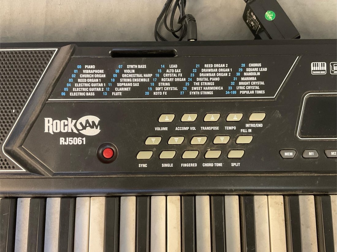 Two Electric Keyboards - 12