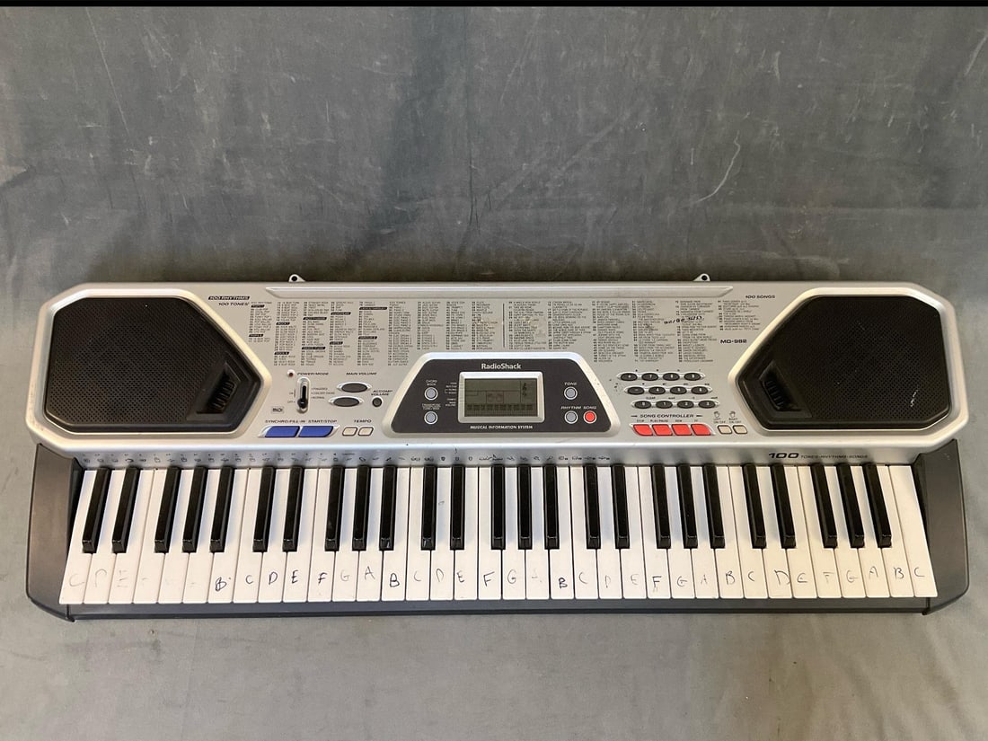 Two Electric Keyboards - 2