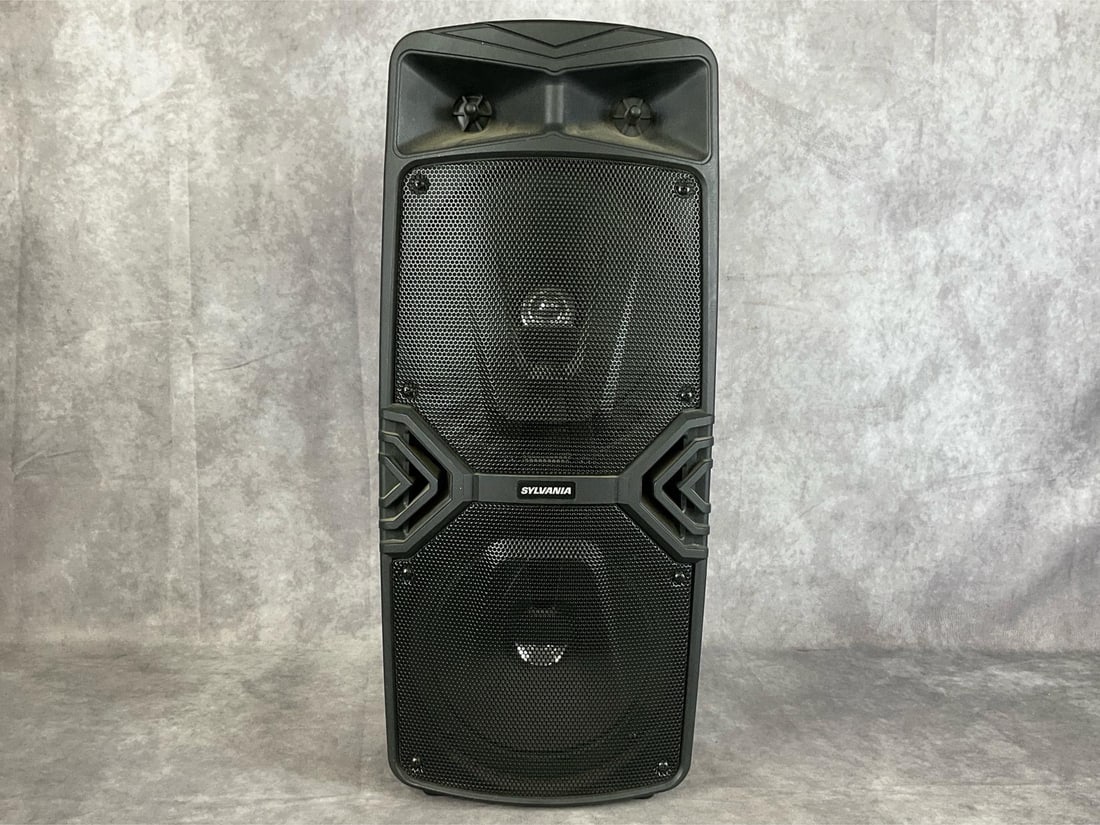 Sylvania Karaoke 2X8 Bluetooth Speaker: Model number sp782. Serial number A2004314950000096. Good used condition, does not include power/charger. Untested. Measures 10 inches wide x 7 x 22 inches tall.
