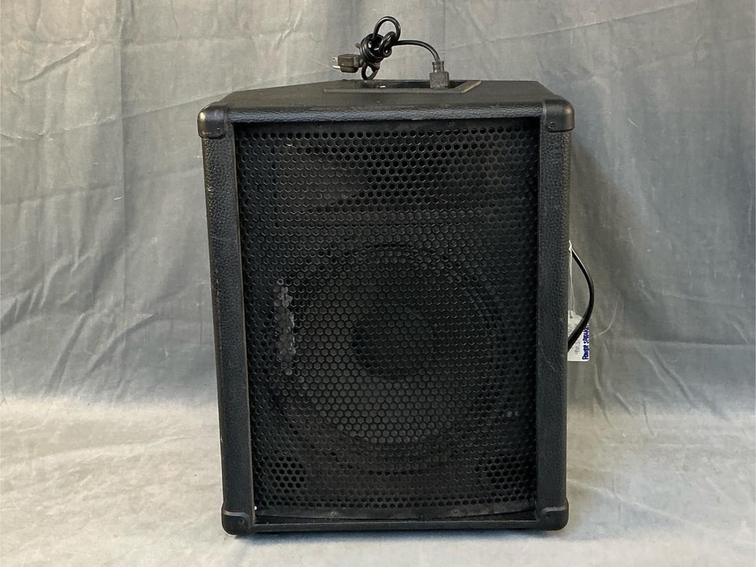Kustom Amplifier: Kustom KPC12MP Powered Speaker. Powers on and works. Measures 16.5 inches wide x 12.5 x 21.5 inches tall.