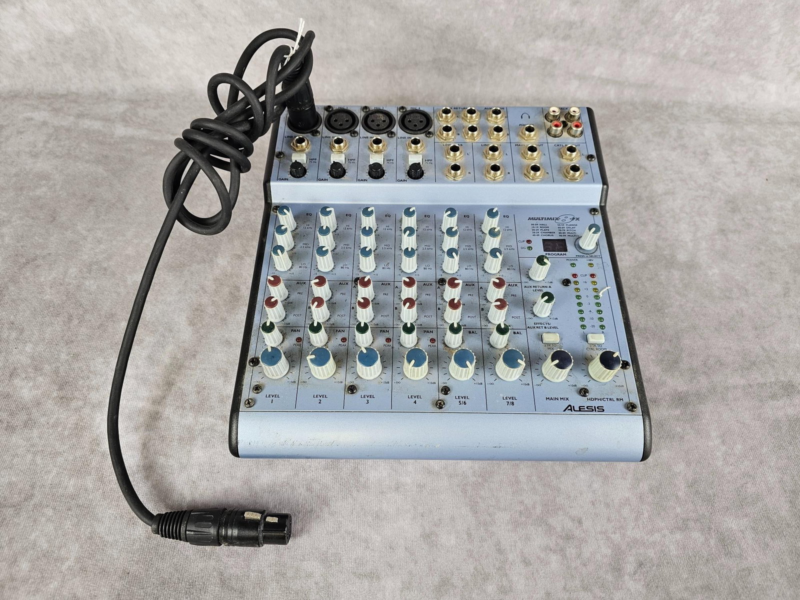 Alesis Multimix 8FX: Eight channel studio mixer with preset effects, includes power cord. Some scratches, good used condition. Measures 9 inches wide x 9.75 inches tall.