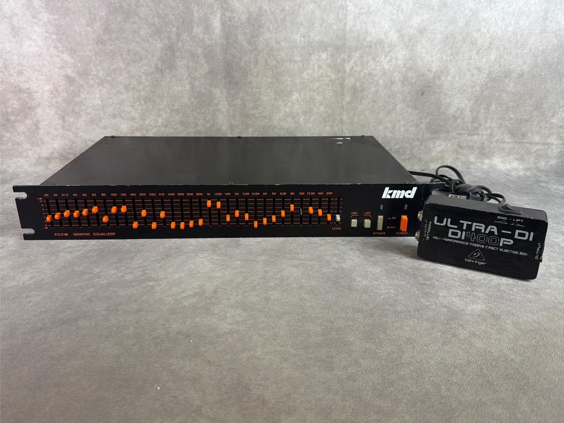 KMD Equalizer & Behringer D1400P: KMD EQ31M graphic equalizer and Behringer D1400p passive direct injection box. Both in good untested condition. KMD measures 17 inches wide x 9.5 inches x 2.75 inches tall.