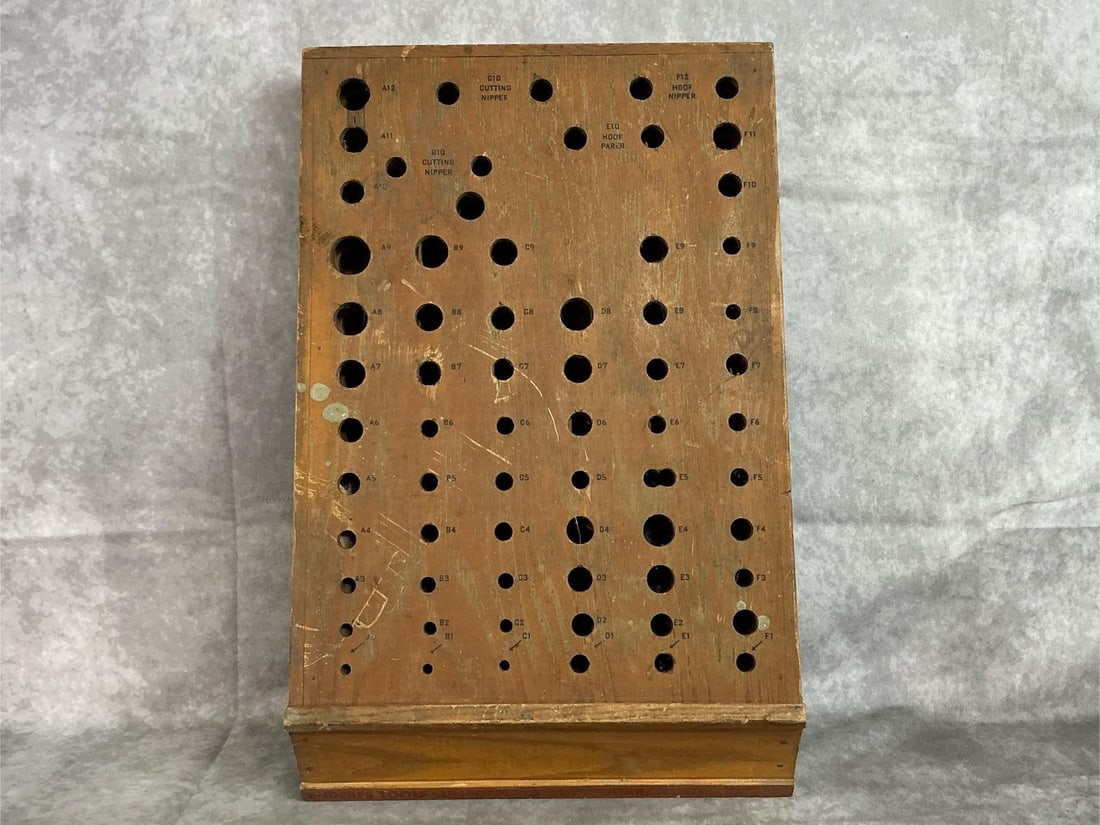 Blacksmithing Tool Rack: Early 1900s wooden rack. Enderes Tools board for blacksmithing or farrier tools. Wood has scratches, otherwise in good condition. Measures 12 inches across x 2 x 18.5 inches tall.