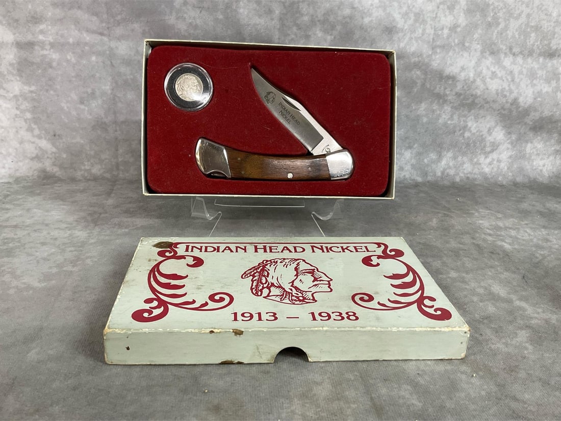 Indian Head Nickel Knife Set: Mid century box set. Cherokee Trapper folding knife with wooden handle and genuine Indian Head Nickel celebrating 1913-1938. Box is worn, otherwise in good condition. Measures 7.75 inches wide x 4.75