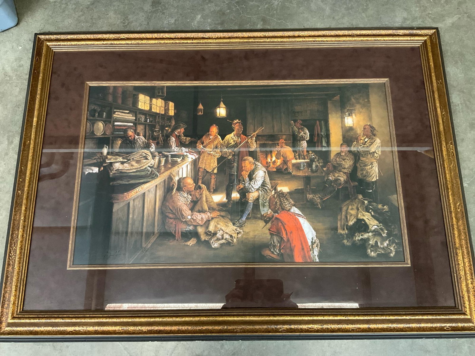 The Winter Trade: Vintage print named The Winter Trade by Robert Griffing. Featuring a 1700's trading post with Native Americans. Matted and framed in burgundy and browns. Outer frame has a few chips. Measures 41