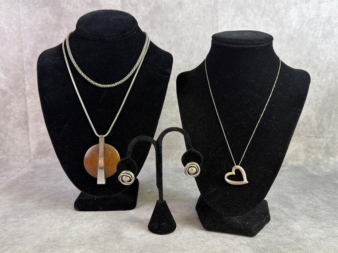 Sterling Silver Jewelry: Lot of three sterling silver chains and a pair of Mexico silver earrings. All in good condition and stamped, with wood pendant having stainless steel wrap. Total weight on sterling only 1.45ozt.