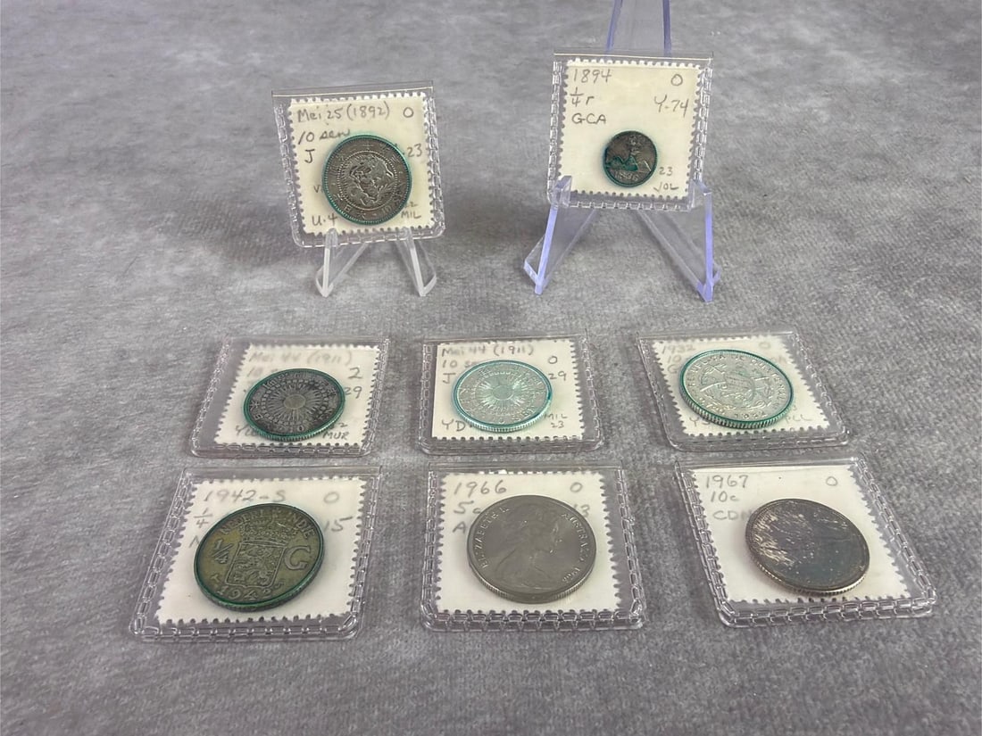 Foreign Silver Coins: Lot of eight foreign silver coins. All in good circulated condition and containing 70 to 80 percent silver. Total weight 0.56 ozt.