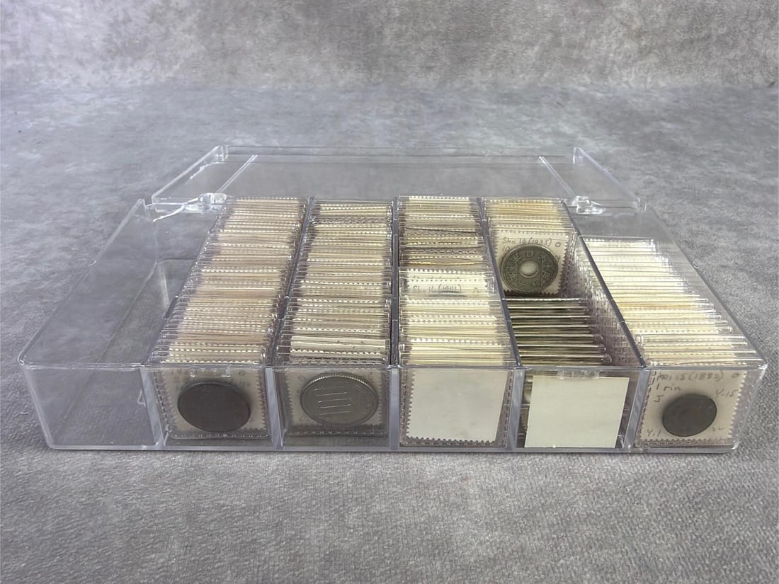 Foreign Coins: Lot of foreign coins ranging in date from 1800 to 1900s and from various countries. All in good circulated condition. Box measures 8 inches wide x 4.5 inches x 1.25 inches tall.