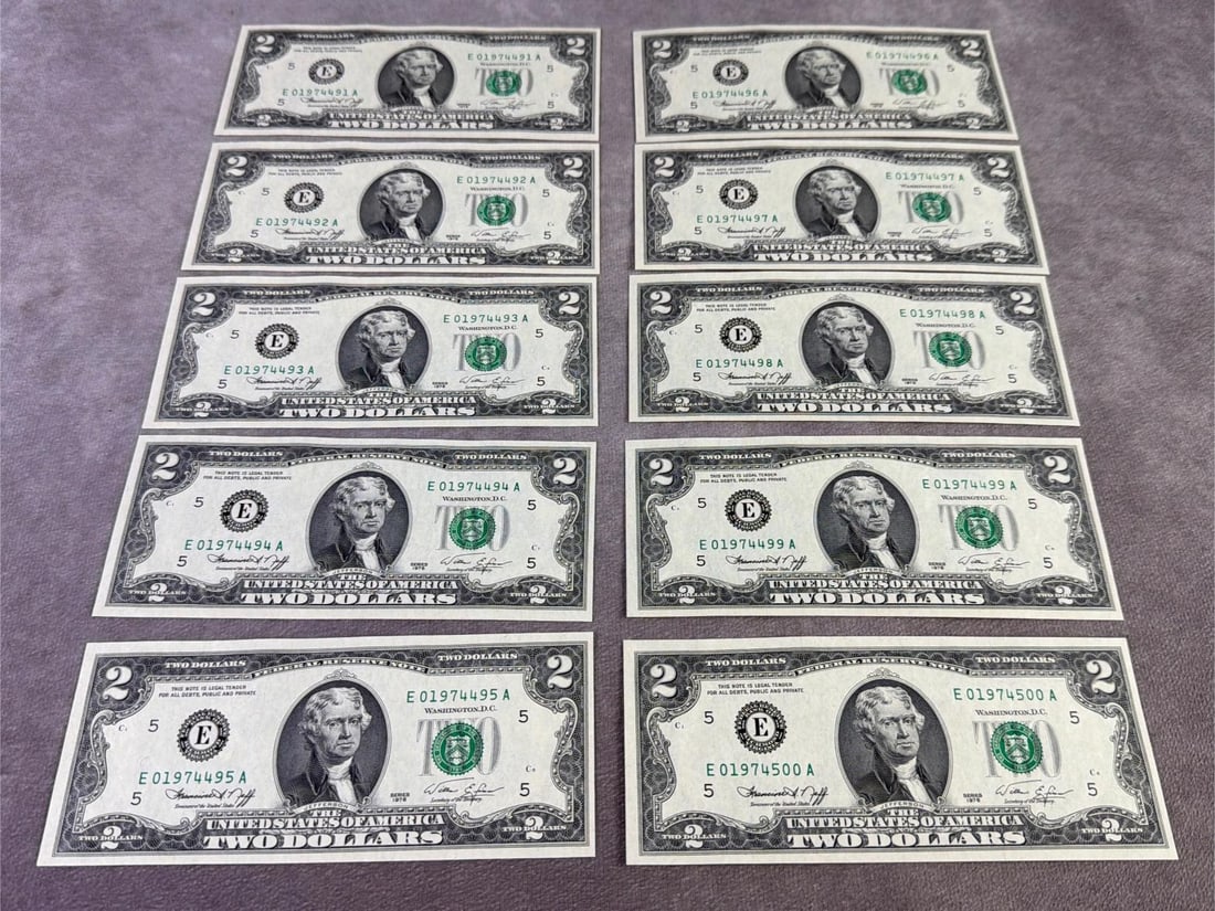 Jefferson Two Dollar Bills: Lot of ten Thomas Jefferson two dollar bills running in sequential serial numbers. All in good condition and appears to be uncirculated. Each bill measures 6.15 inches wide x 2.65 inches tall.