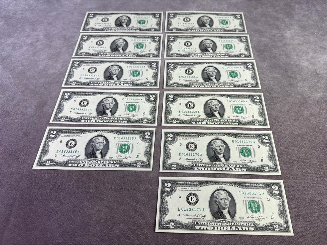 Jefferson Two Dollar Bills: Lot of eleven Thomas Jefferson two dollar bills running in sequential serial numbers. All in good condition and appears to be uncirculated. Each bill measures 6.15 inches wide x 2.65 inches tall.