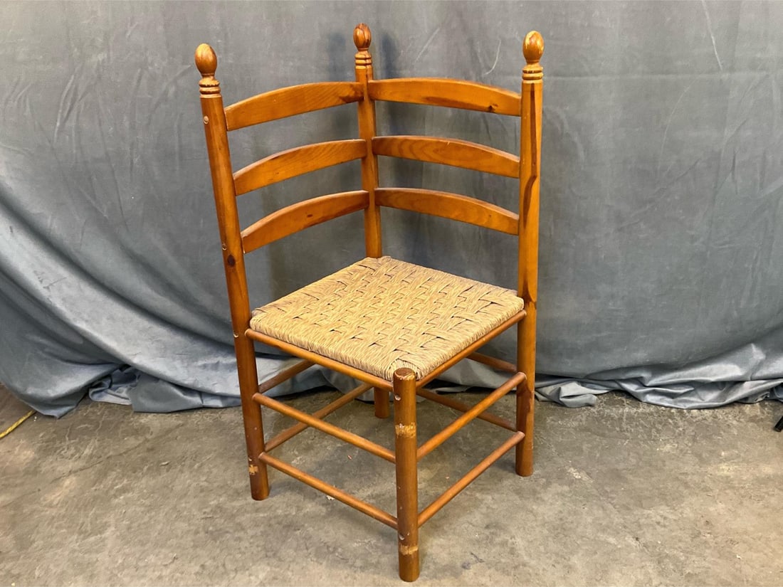 Corner Chair: Late twentieth century pine Sheraton Style corner chair with rush seat. Good condition. Measures 25 inches wide x 24.5 x 38 inches tall.