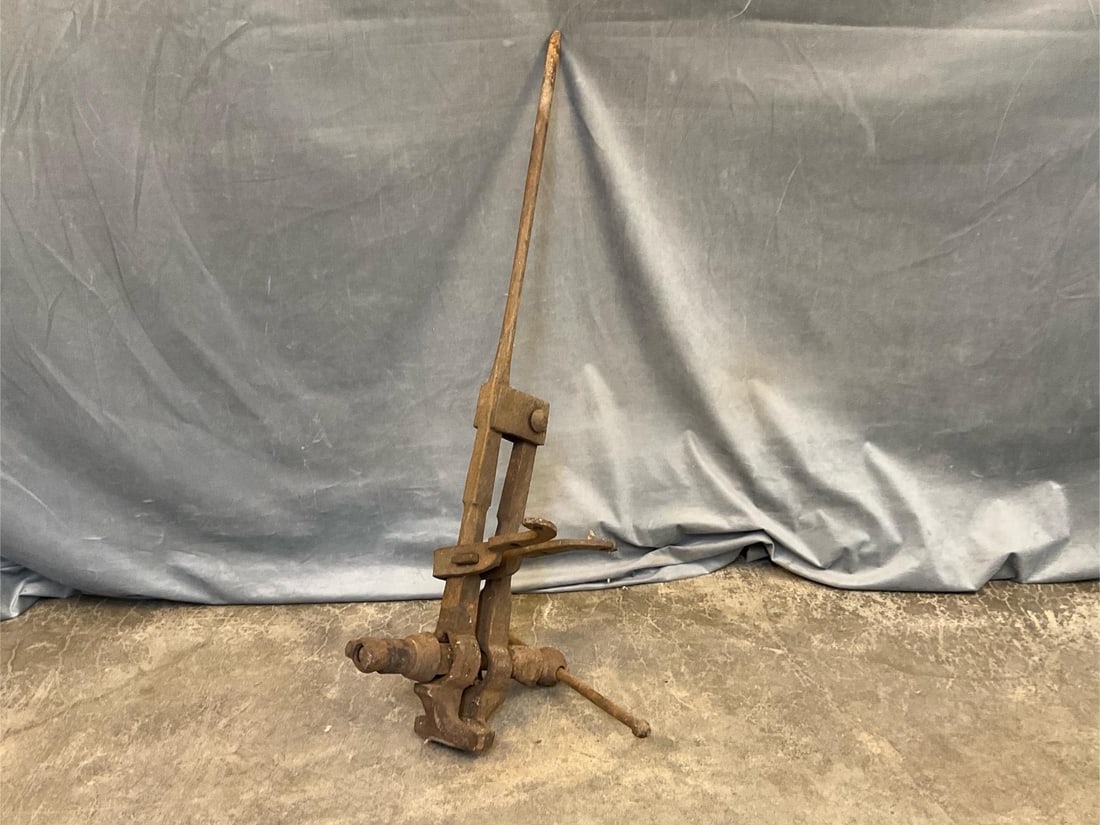 Blacksmith Vise: 19th - early 20th century iron hand wrought blacksmith post leg vise. Functional good condition. Measures 14 inches wide x 9 x 41 inches tall.