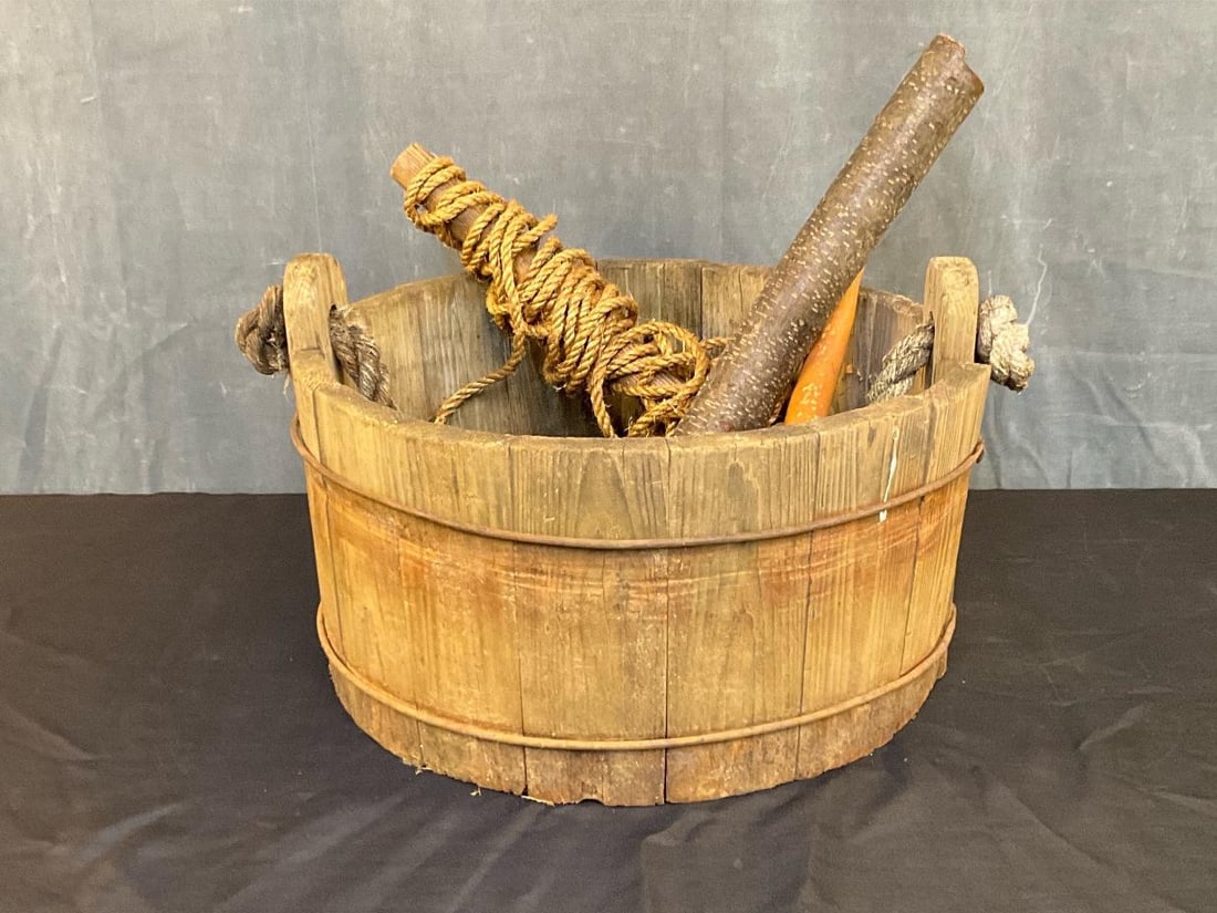 Wooden Well Bucket: Late twentieth century staved pine and iron banded well bucket with wooden retrieval stick with attached hemp rope. Includes gourd dipper and extra stick. Loose Staves. Previously used for 18th