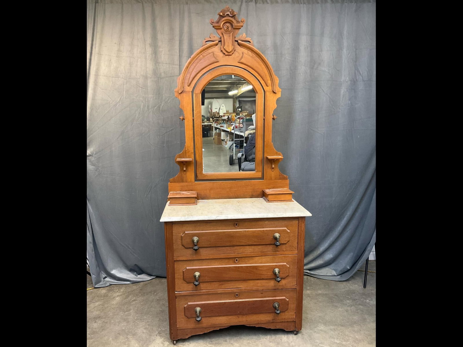 Eastlake Chest of Drawers: Late 19th century Victorian Eastlake Style three drawer walnut marble top vanity/chest of drawers with mirror and two “glove” boxes. Shipping label to back of chest stating “For [illegible