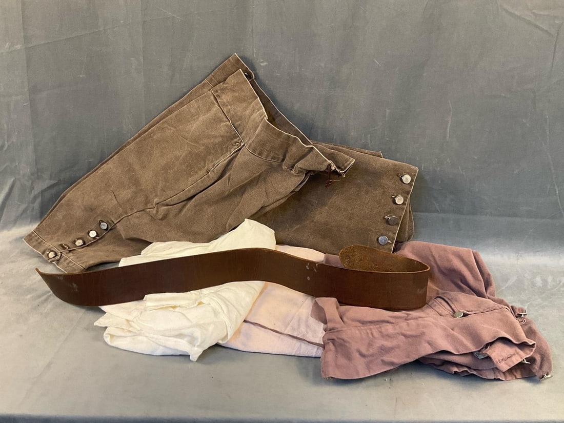 Colonial Reenactor Clothing: Reproduction 18th century Colonial Reenactor men's clothing. Two pairs of heavy cotton britches, one linen shirt, one heavy cotton vest, one cotton shirt, and one leather belt without buckle. Good