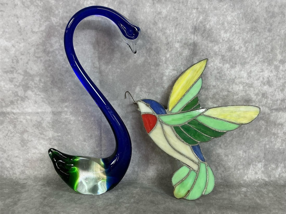 Stained Glass Hummingbird & Glass Swan: Two vintage glass items. Stained glass hummingbird with frosted color glass and Art glass swan. Hummingbird has beak missing. Swan measures 5.75 inches wide x 2.5 x 13 inches tall.