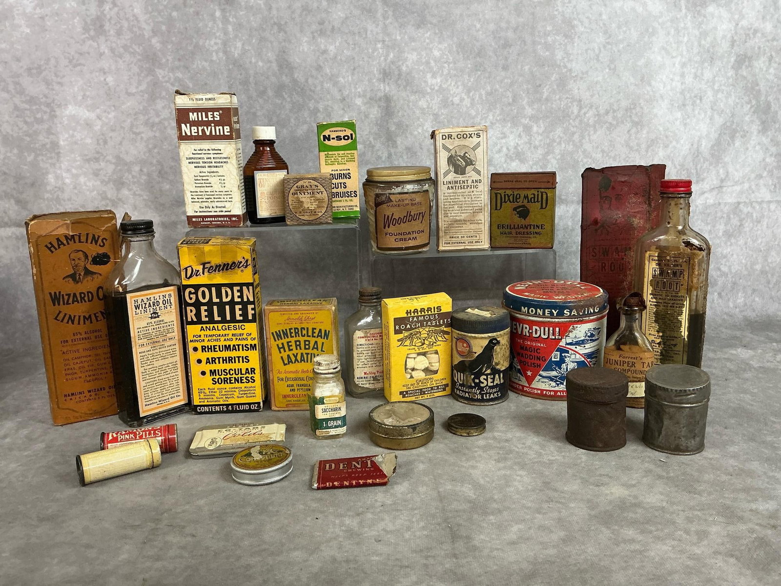Vintage Pharmacy Finds: Twenty-five late 1800's to mid 1900's items. Hamlins Wizard Oil, Kilmer's Swamp Root, Ramon's Cold Tabs, Innerclean Laxative, and more salves and liquids. Includes Quick Seal radiator leak,
