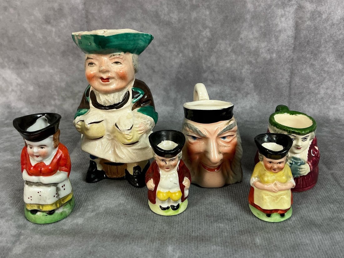 Miniatures Lot: Over 30 vintage miniature pieces. Six Toby style pitchers from Japan, Czechoslovakia, and Germany. Ten blown glass, five metal, luster, porcelain, shell, and more. Fair to good condition. Largest