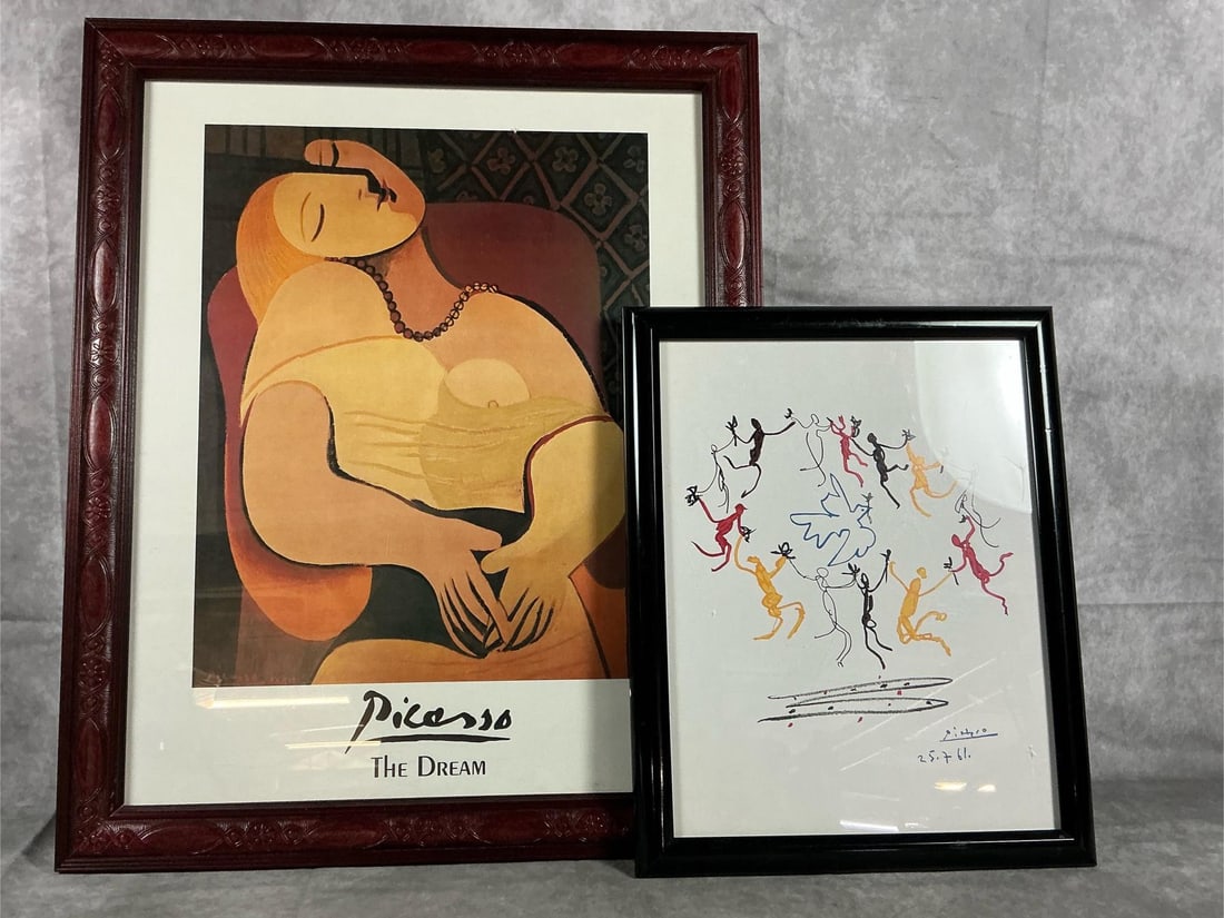 Picasso Prints: Two Picasso lithographs originally painted in mid 1900's. The Dream print in wooden frame and The Dance of Youth in black plastic frame. The Dance has a crack on right side. Dream measures 18.25
