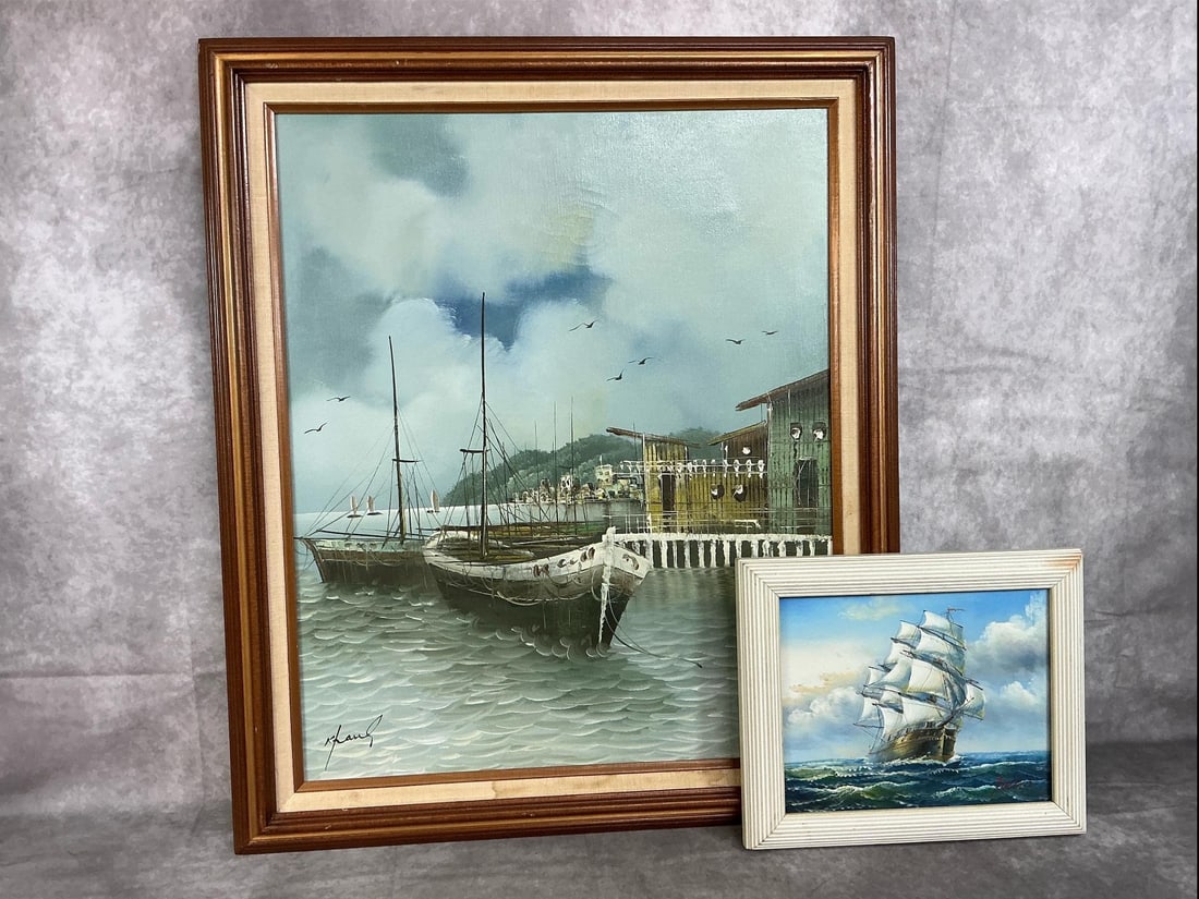 Seascape Oil Paintings: Two vintage oil paintings. Harbor scene by K Frank matted and in wood frame. Small oil painting of clipper on waves signed and in white wood frame. Frames are discolored and worn. Harbor painting meas
