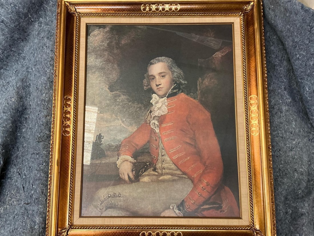 Portrait of Captain Bligh: Giclee print of Captain Bligh in ornate gold gilt frame. Originally painted in 1780 by Sir Joshua Reynolds. In good condition. Measures 30.5 inches wide x 2 x 36 inches tall.