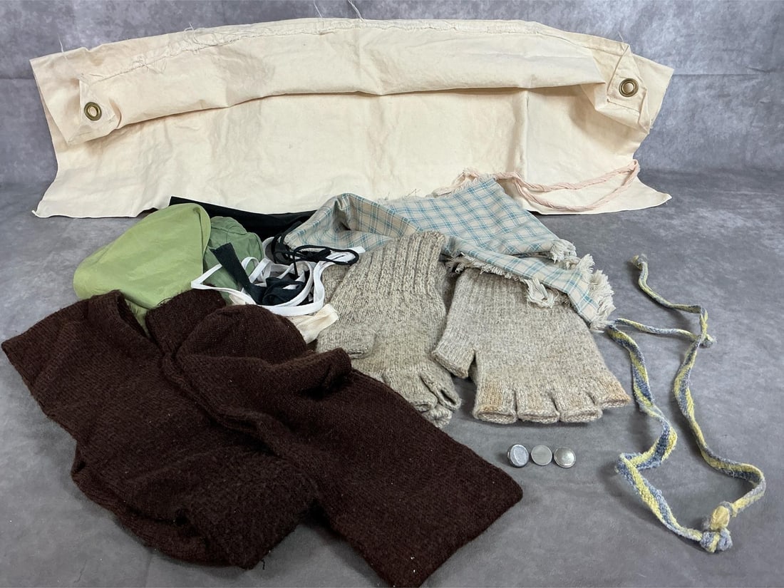 Reenactors Travel Cloth, Gloves, Socks, & More: Lot of mid century reenactors items. Travel canvas cloth with pockets, two pair of fingerless wool gloves, and brown long socks. Includes two green scarves, three metal buttons, and more. Items in