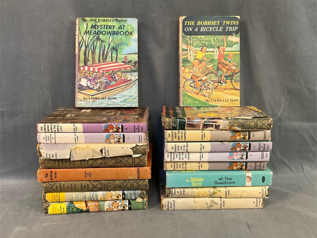 Bobbsey Twins Books: Lot of eighteen 1950's and mostly 1960's The Bobbsey Twins children's books by Laura Lee Hope. Titles including; “The Bobbsey Twins On A Bicycle Trip”, “Mystery At Meadowbrook”, and ��