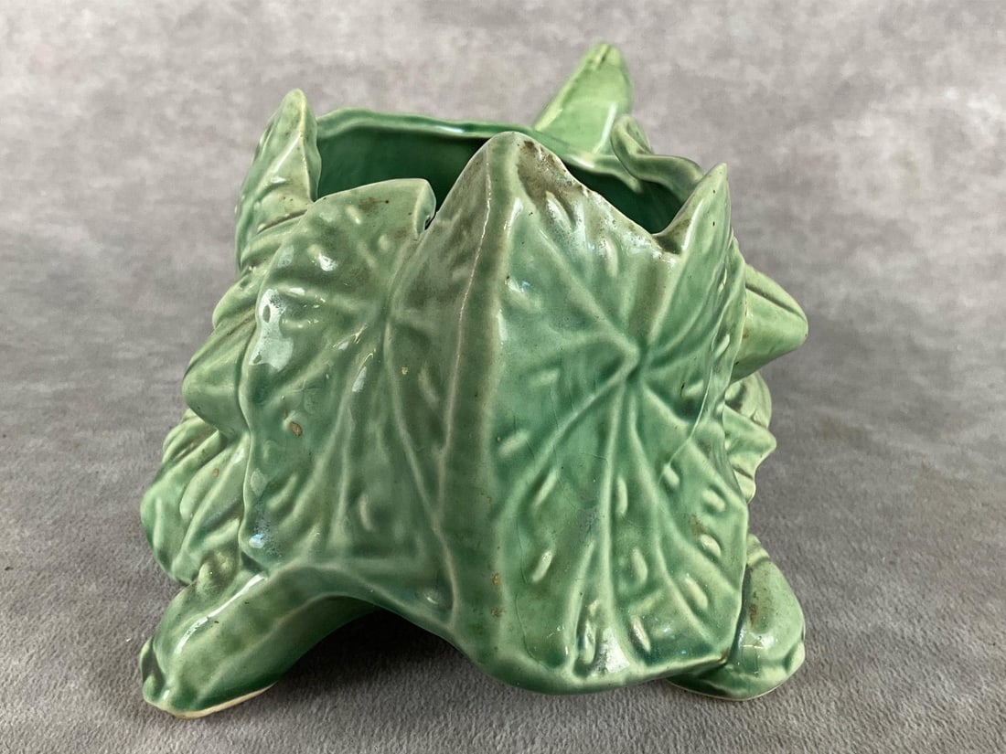 1940's Turtle Planter: Green, stamped McCoy. Chip on right front foot and crazing, otherwise good condition. Measures 8 inches long x 4.5 inches tall.