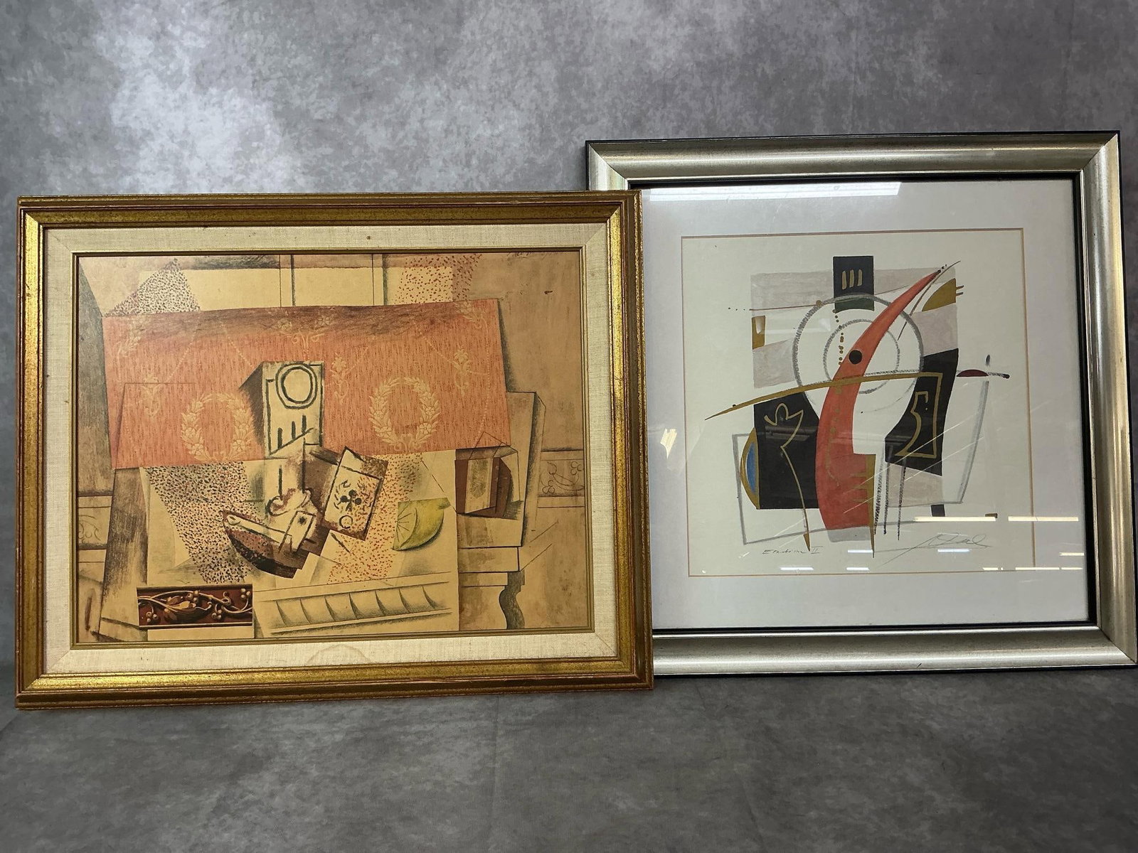 Abstract Art: Two modern prints. “Still Life with Red Wallpaper “ by Picasso in gold tone frame. “Emotion II” by Alfred Gockel in silver frame with signature. Picasso shows some wear, and measures 21.5