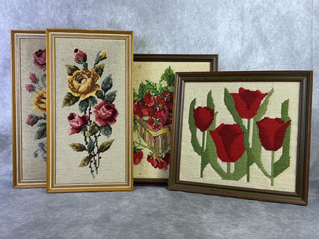 Framed Needlepoint: Lot of four framed needlepoint art depicting, tulips, strawberries, and roses. All in good condition with minor discoloration. Largest measures 13.5 inches wide x 15 inches tall.