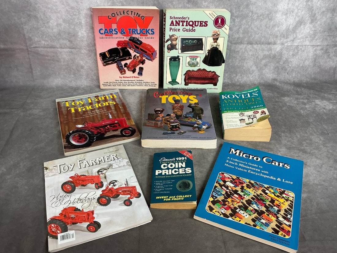 Collectors Guides: Eight late century collectors books. Includes Antiques, Toy Tractors, Micro Cars, Toys, and coins. Largest measures 8.5 inches wide x 1 x 11 inches tall.