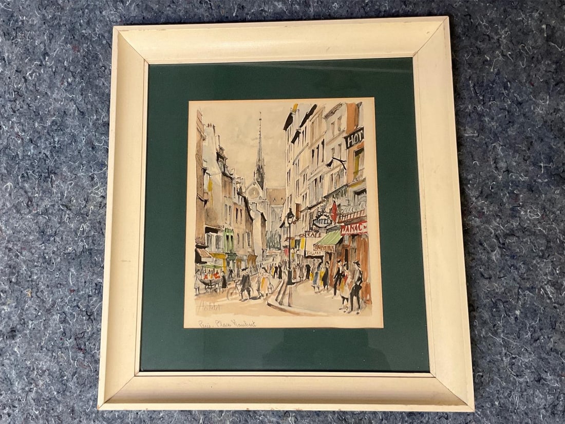Parisienne Street Print: MCM vintage Parisienne lithograph of a watercolour by Franz Herbelot of “Paris. Place Haubert”. Signed in lower left. Period frame. Good condition. Measures 17 inches wide x 1.5 x 18.75