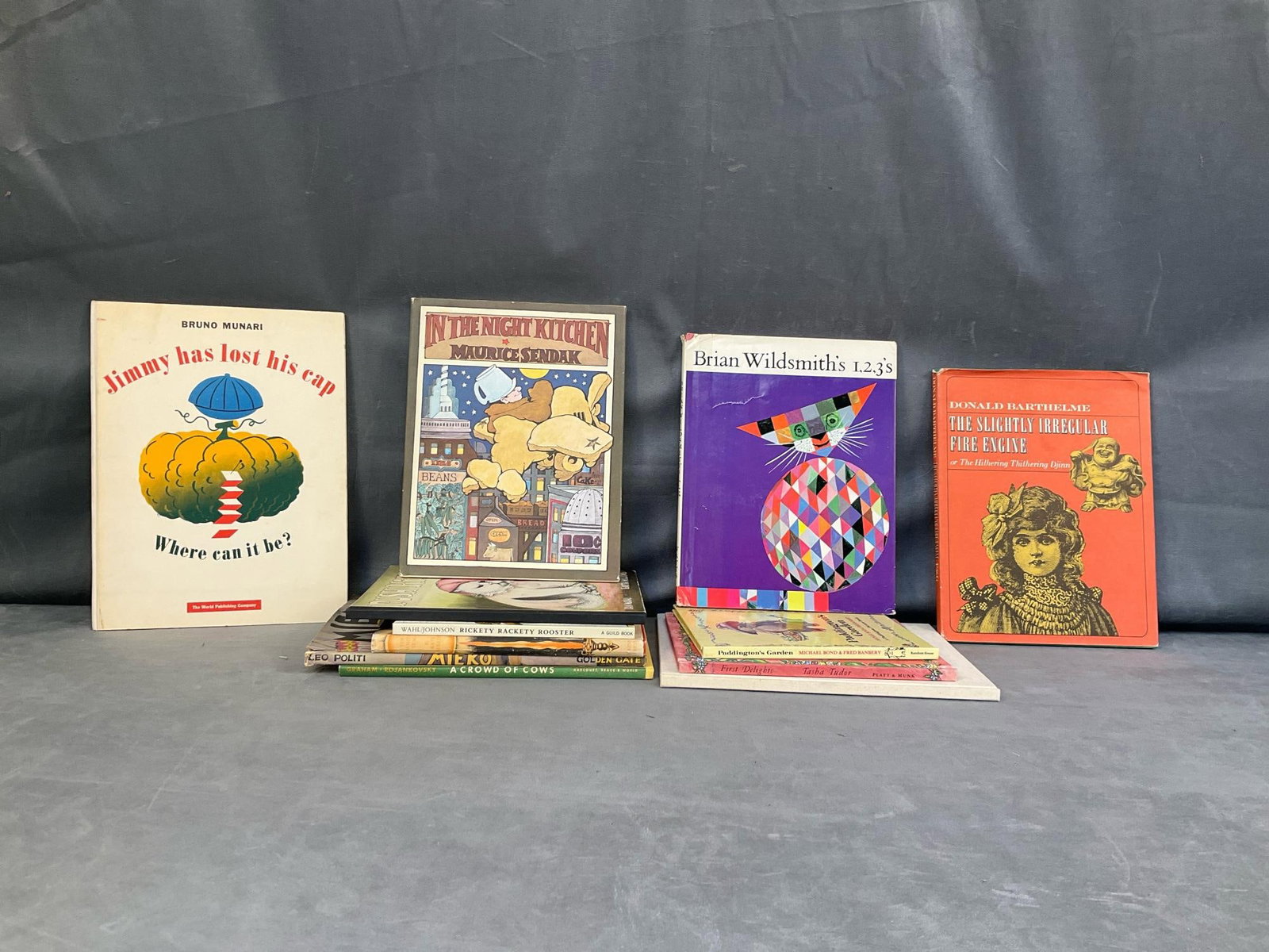 Children's Books: Lot of twelve mostly 1960's vintage collectible children's books. Titles include, “ Jimmy has lost his cap” by Bruno Munari. “In The Night Kitchen” by Maurice Sendak published 1970.