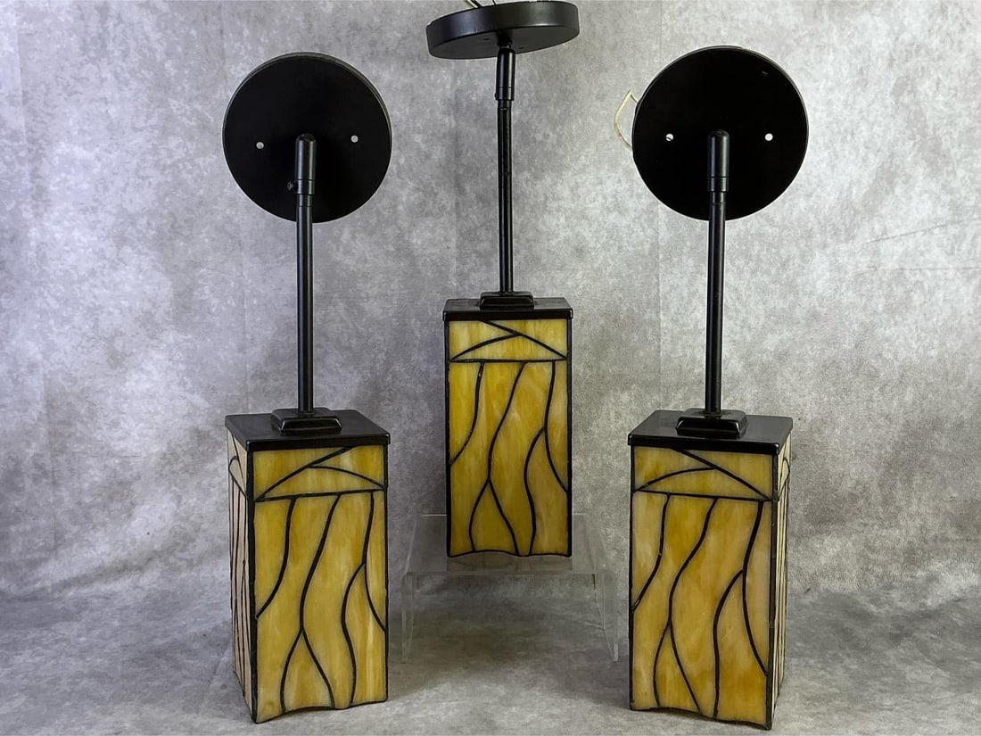 Rustic Tiffany Style Trio: Lot of three Robert Louis Tiffany style bronze rustic style light fixtures. All in good condition, untested. Each measures 4 inches wide x 17.5 inches tall.