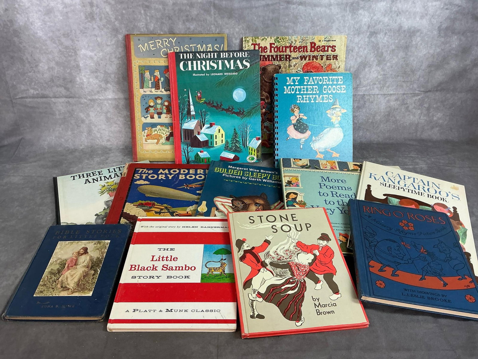 Classic Children's Books: Fourteen children's books from 1926- 1985. Included are The Night before Christmas, 1985 remake of Little Black Sambo, Golden Sleepy Book, Stone Soup, and Favorite Mother Goose Rhymes. Also Bible
