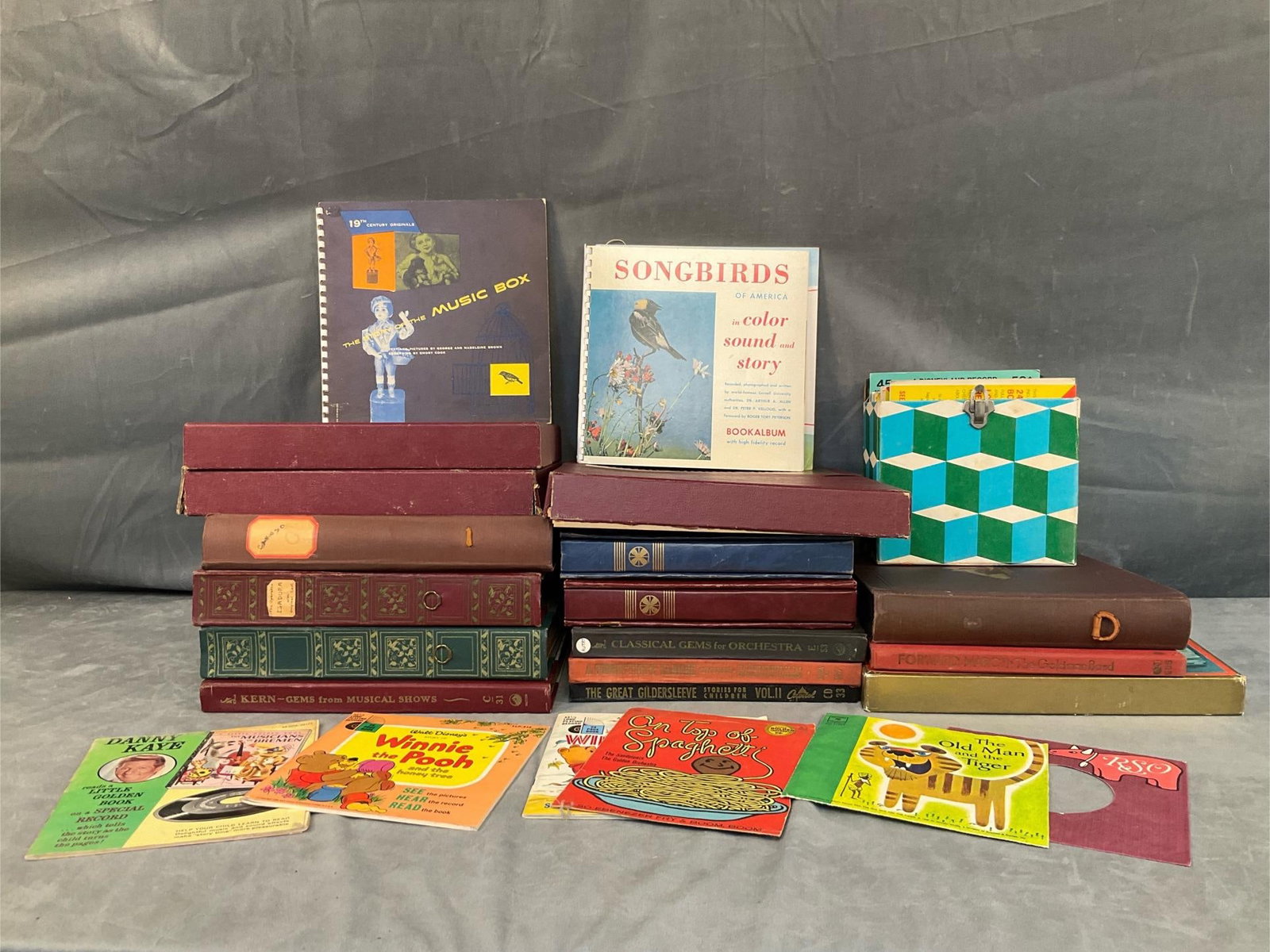 78 and 45 Records: Early twentieth century lot of approximately seventeen 78's and approximately twenty five 45's. Titles include “A Connecticut Yankee”, “Caruso”, “Forward March”, “Mother Goos