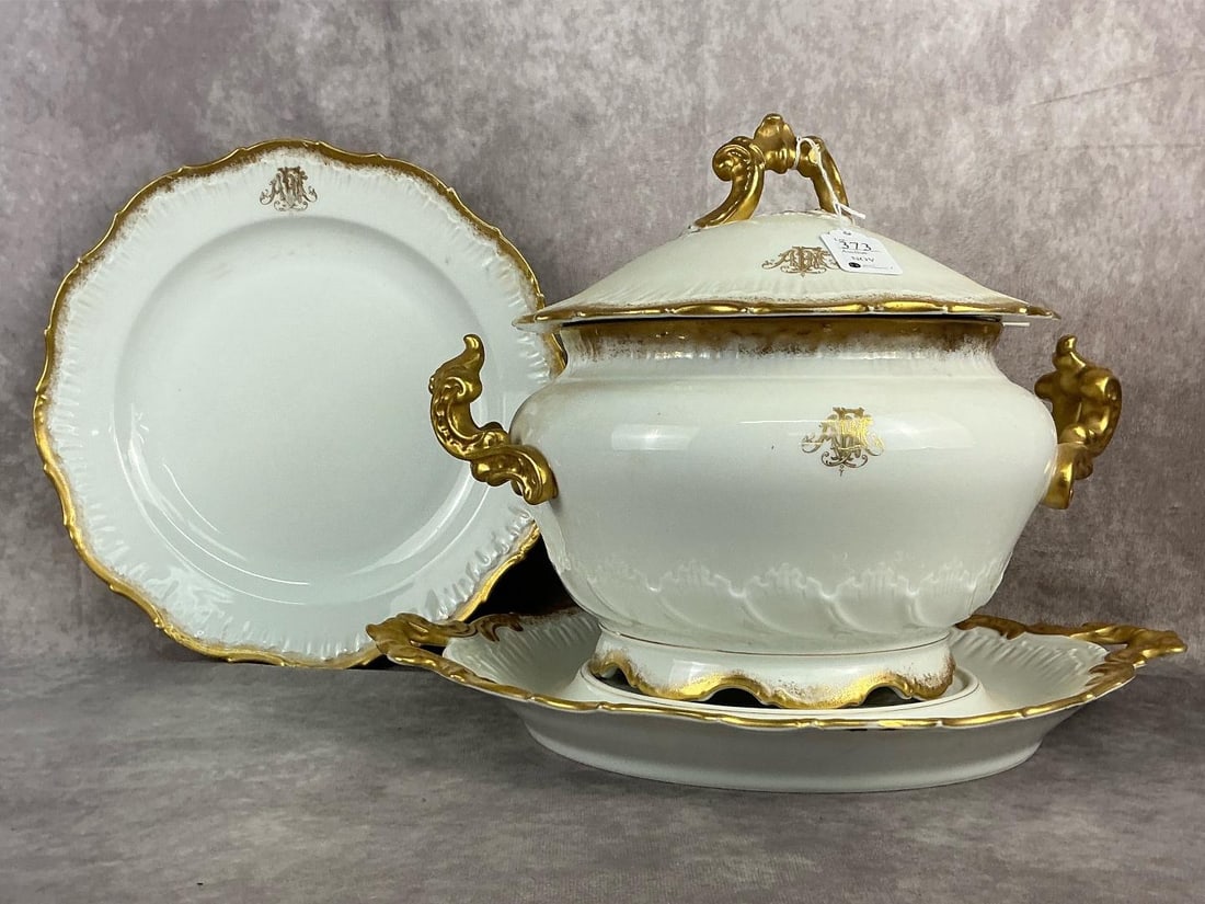 Porcelain Guilded Tureen: Circa 1900 possibly Limoges by Haviland however unmarked. Marked with impressed registry or production number “2D 51 1260”. One tureen with lid, underplate and large plate. All four pieces