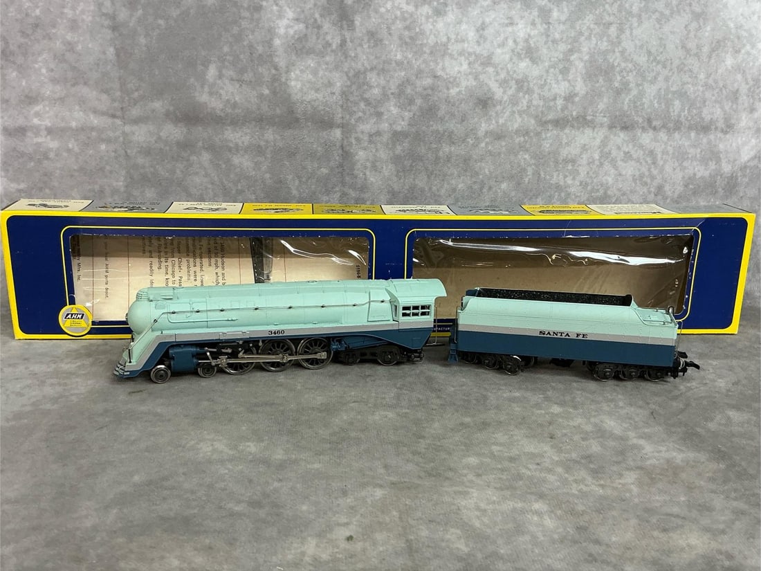 AHM Blue Goose Locomotive: 1970's steam locomotive and coal car. AHM 4-6-4 Hudson "Blue Goose " #5196-B Sante Fe set. Original box measures 20 inches long x 2 x 3.5 inches tall.